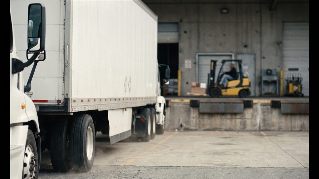 Truck at a loading dock — Pickup Watch tracks every scheduled pickup